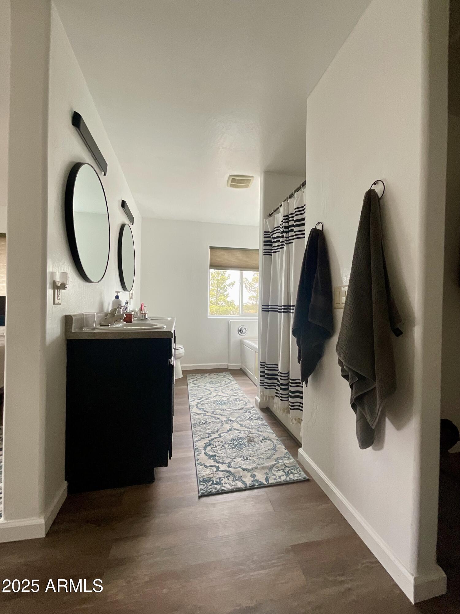 242 County Road Concho, AZ 85924 - Photo 23 of 63 a bathroom with a sink and a mirror