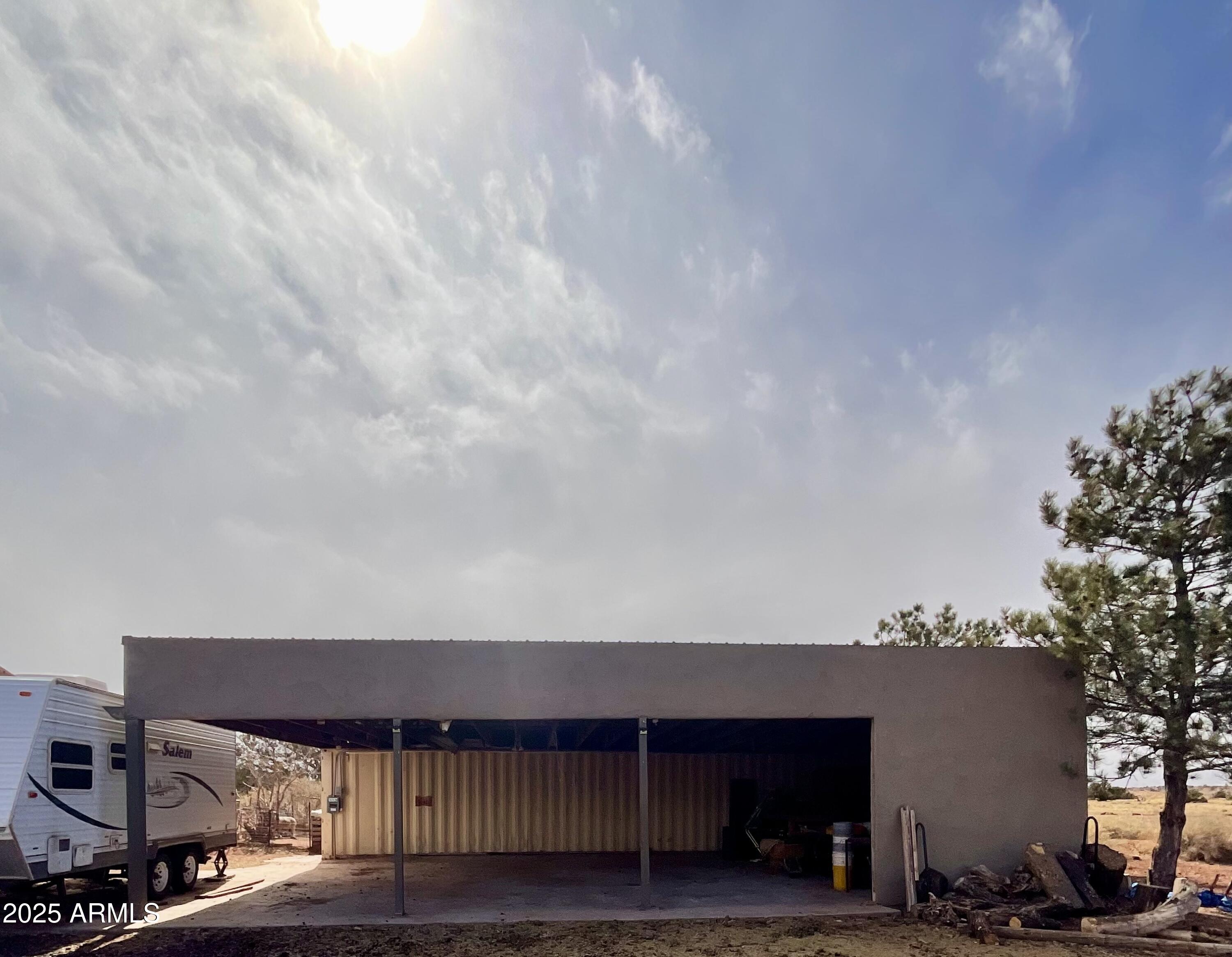 242 County Road Concho, AZ 85924 - Photo 29 of 63 a view of building with car parked