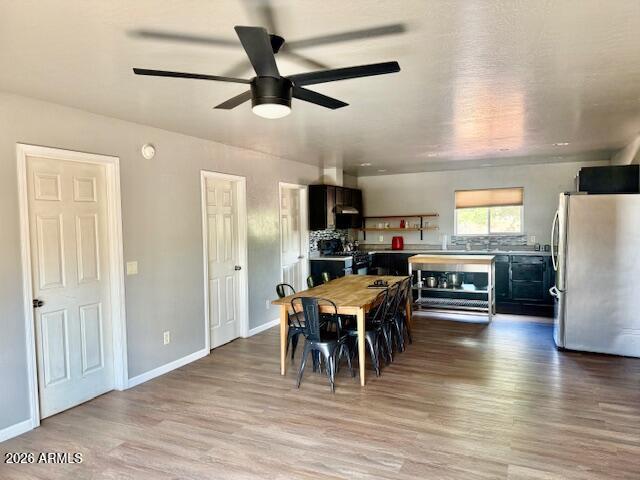 242 County Road Concho, AZ 85924 - Photo 5 of 63 a dining room with furniture and wooden floor