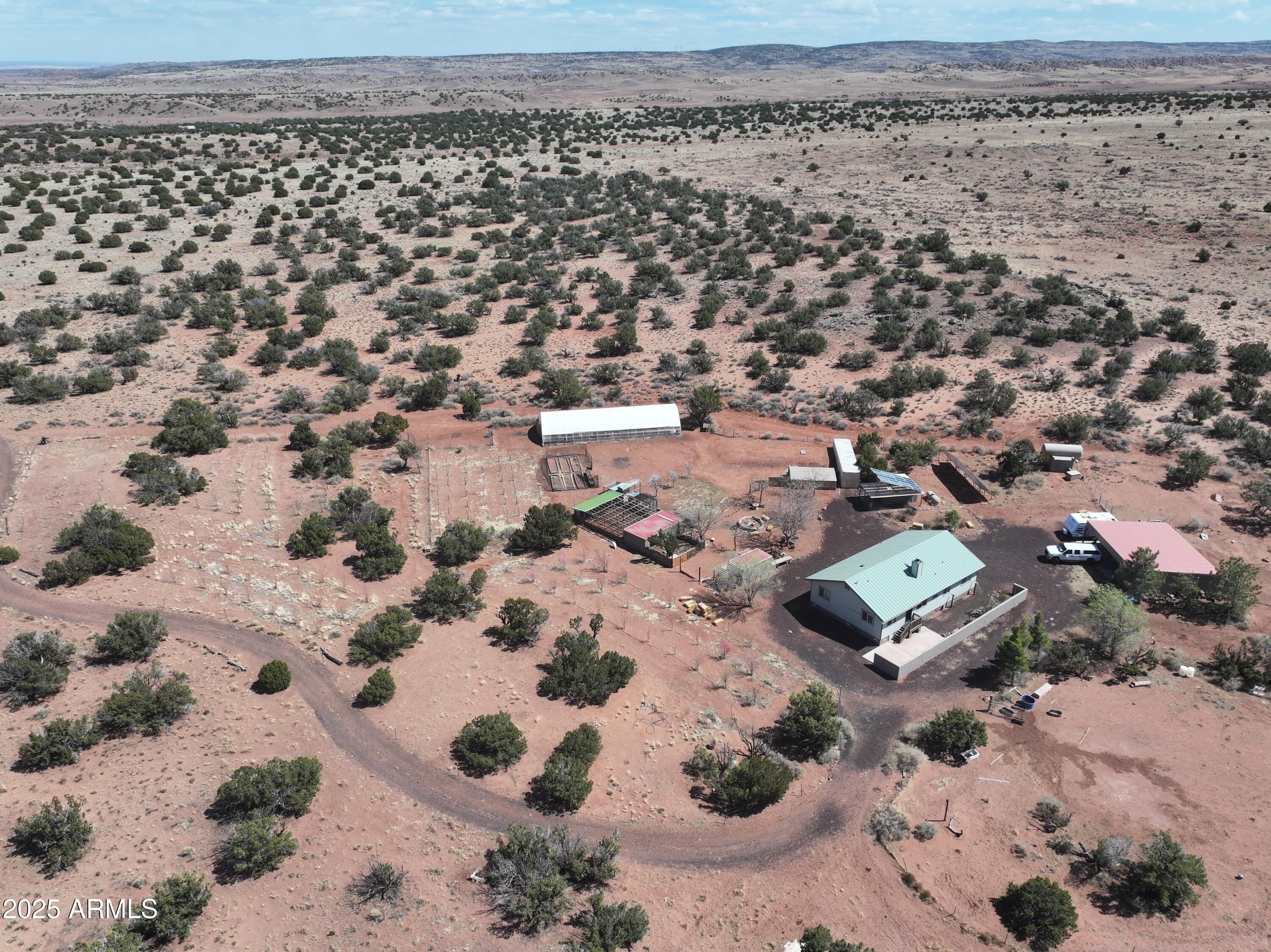 242 County Road Concho, AZ 85924 - Photo 61 of 63 Aerial view of the buildings and space.