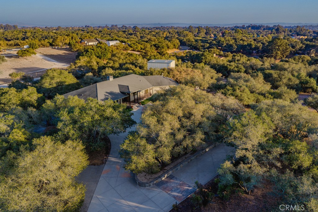 755 Willow Road Nipomo, CA 93444 - Photo 40 of 43 Drone footage that displays the umbrella of beautiful oak trees on this property