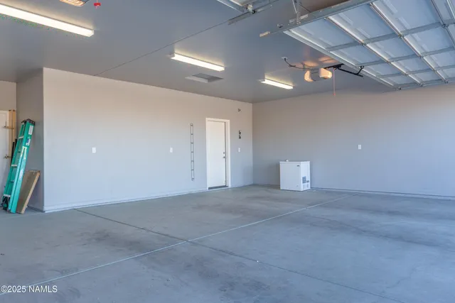 a view of front of house with garage