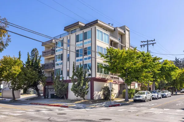a front view of a building with street view