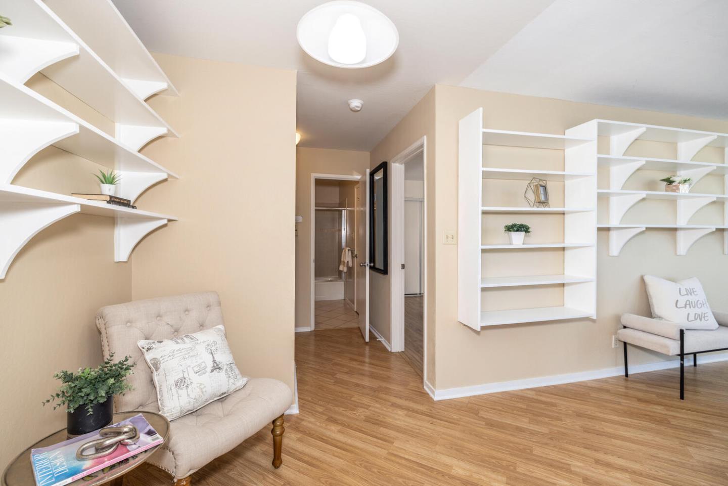 2201 Virginia Street, Unit 2 Berkeley, CA 94709 - Photo 15 of 24 a living room with furniture and a wooden floor