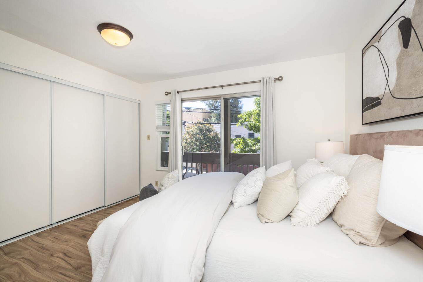 2201 Virginia Street, Unit 2 Berkeley, CA 94709 - Photo 16 of 24 a bedroom with a bed and a window