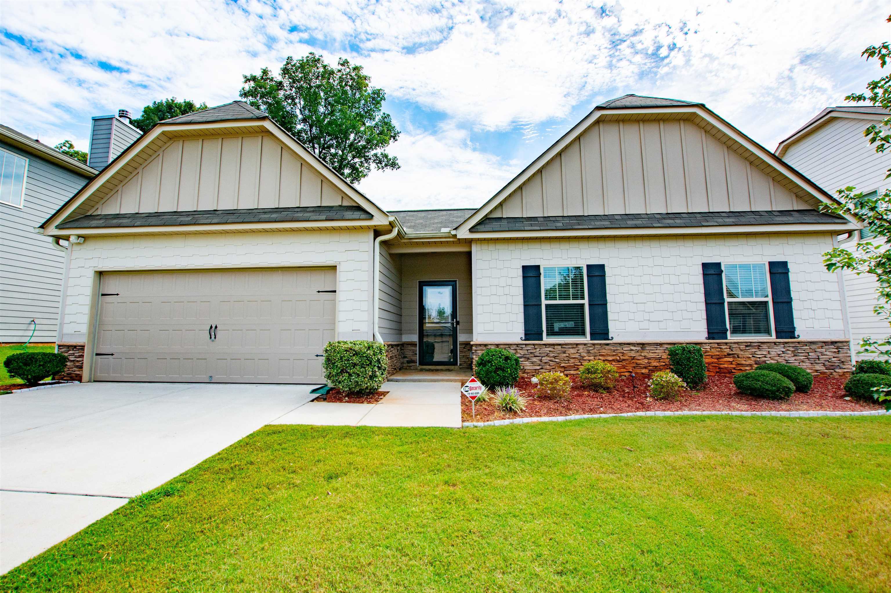 2560 Grayton Loop Villa Rica, GA 30180 - Photo 1 of 1 a front view of a house with yard