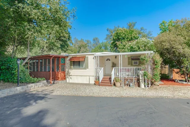 a view of a house with a patio