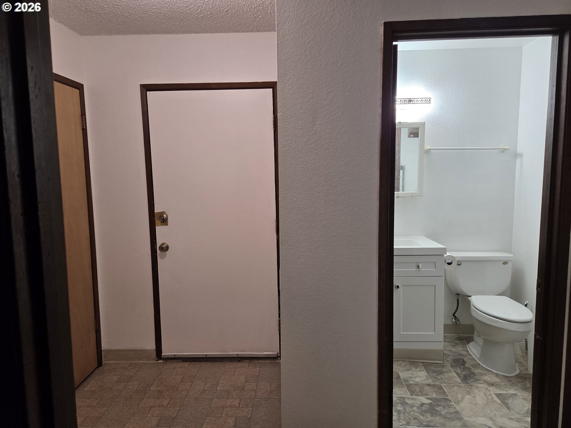 13397 Southwest 17th Street Beaverton, OR 97008 - Photo 20 of 31 a bathroom with a granite countertop toilet and a sink