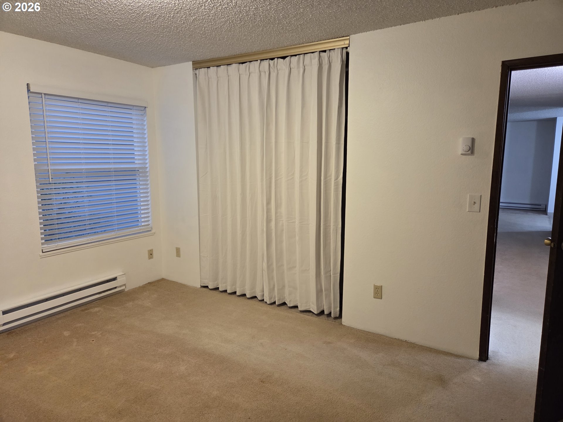 13397 Southwest 17th Street Beaverton, OR 97008 - Photo 27 of 31 an empty room with windows