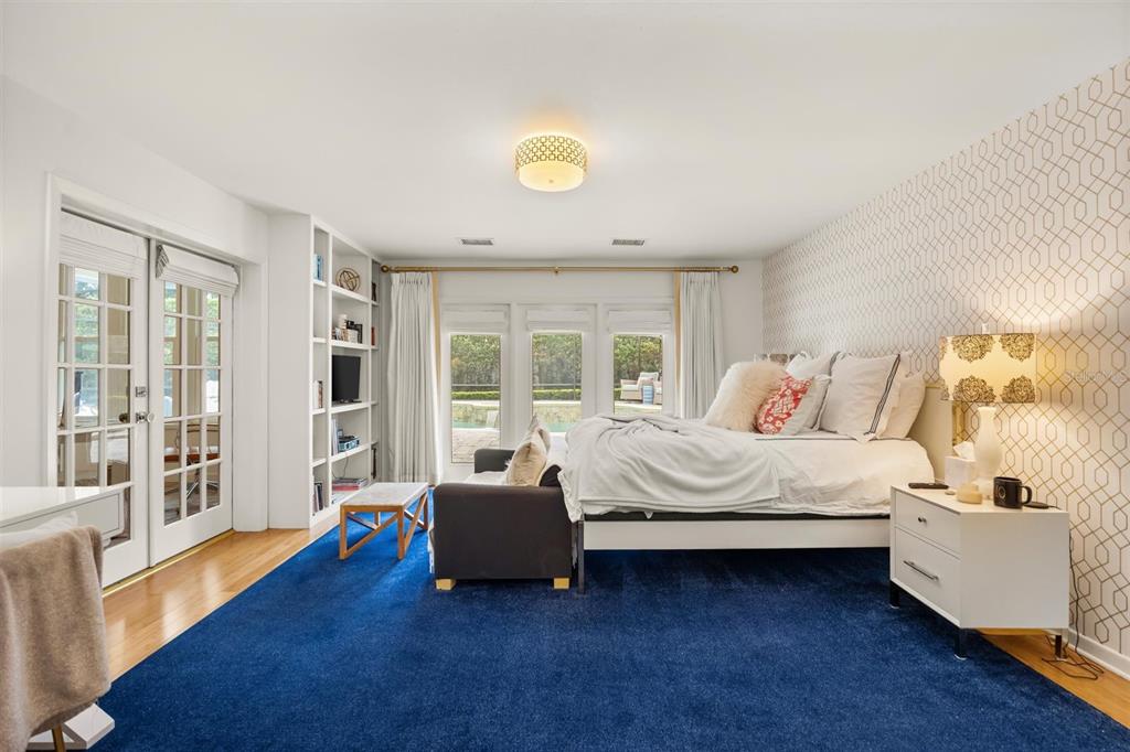 800 Juanita Rael Road Winter Park, FL 32789 - Photo 26 of 36 a bedroom with a bed and wooden floor