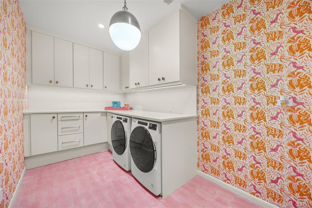 800 Juanita Rael Road Winter Park, FL 32789 - Photo 30 of 36 a utility room with dryer and washer