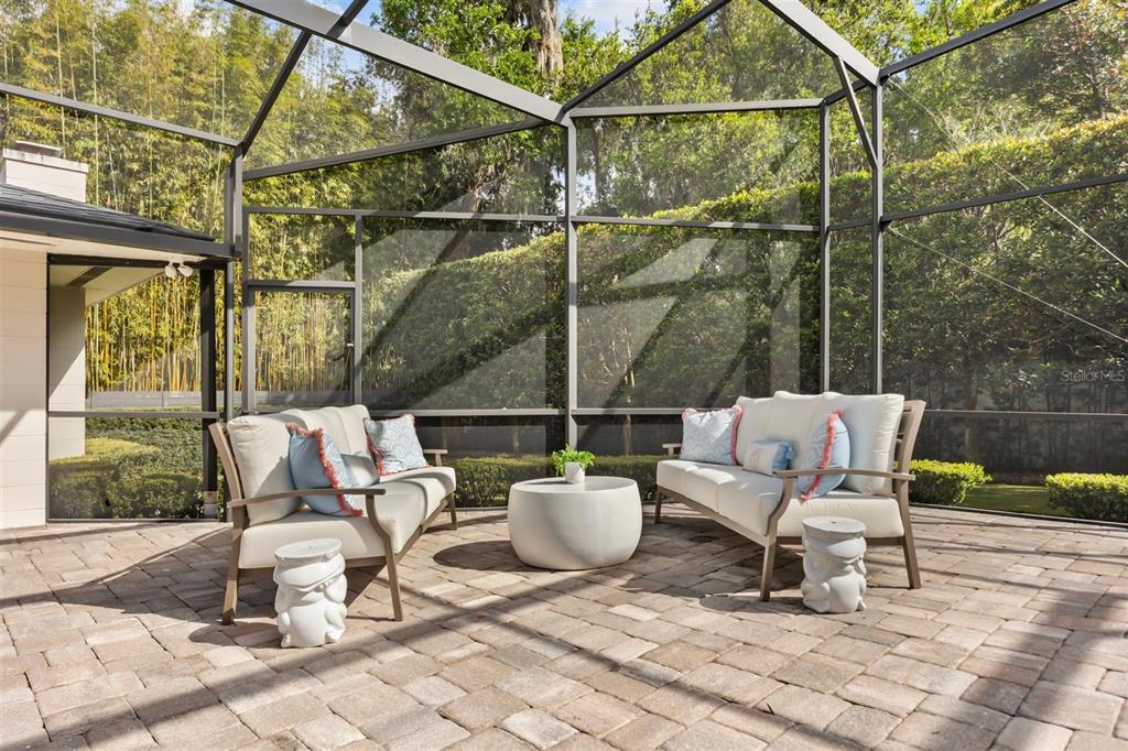 800 Juanita Rael Road Winter Park, FL 32789 - Photo 31 of 36 a view of a patio with couple of chairs and a fountain