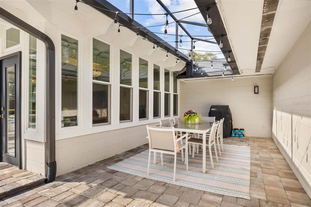 800 Juanita Rael Road Winter Park, FL 32789 - Photo 32 of 36 a dining room with furniture and window