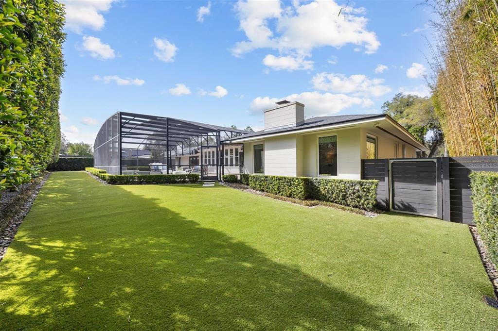 800 Juanita Rael Road Winter Park, FL 32789 - Photo 33 of 36 a view of a house with a big yard