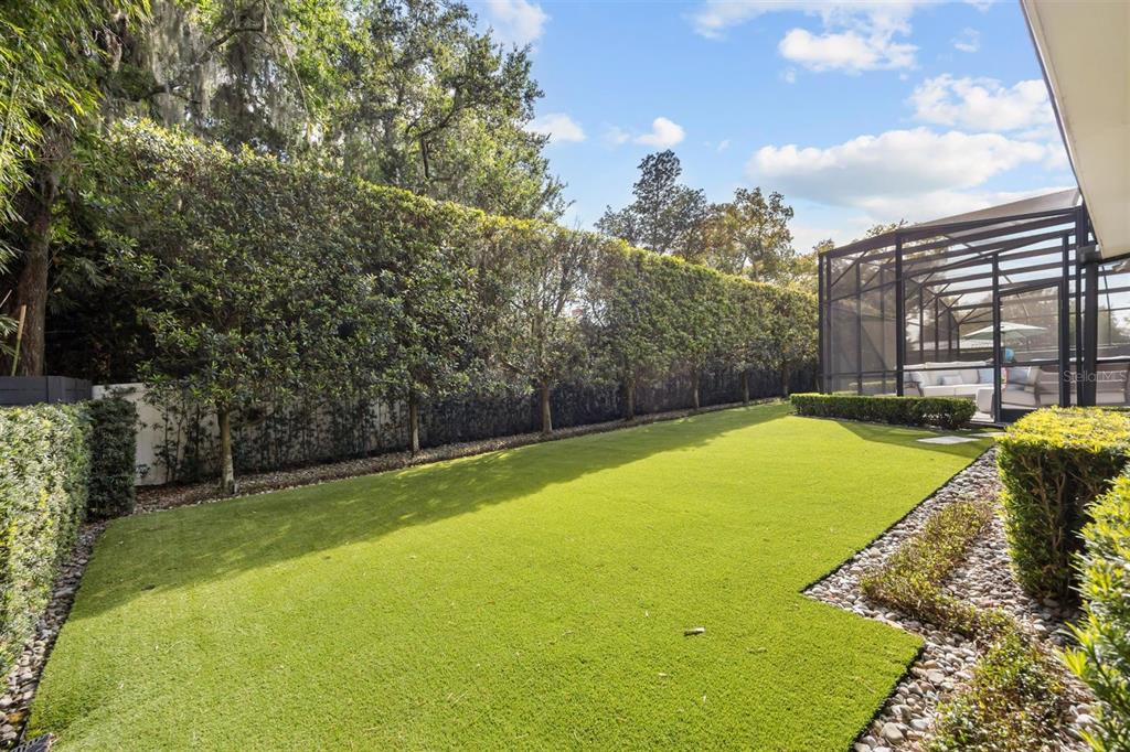 800 Juanita Rael Road Winter Park, FL 32789 - Photo 34 of 36 a view of a backyard with a swimming pool