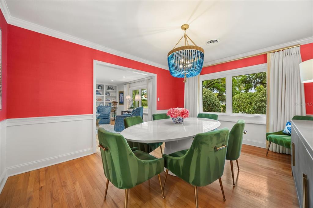 800 Juanita Rael Road Winter Park, FL 32789 - Photo 9 of 36 a view of a dining room with furniture window and wooden floor