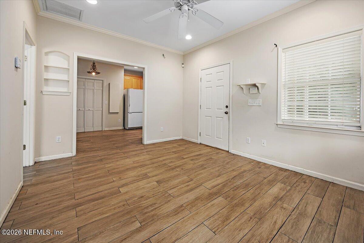 14154 Mandarin Road Jacksonville, FL 32223 - Photo 27 of 48 27-Guest House Living Room to Dining_Kit