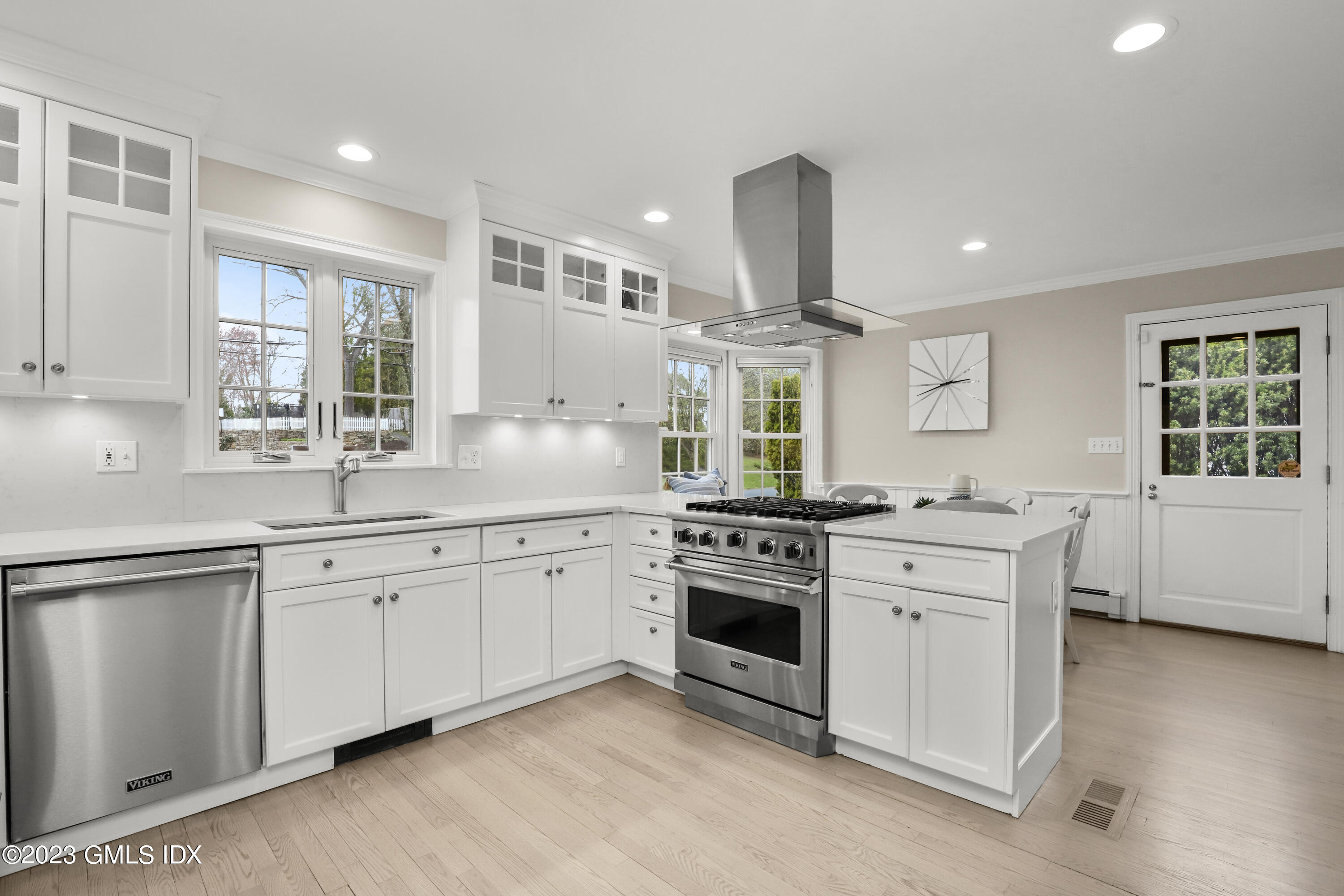 33 Bote Road Greenwich, CT 06830 - Photo 15 of 33 a kitchen with granite countertop a sink stainless steel appliances and window