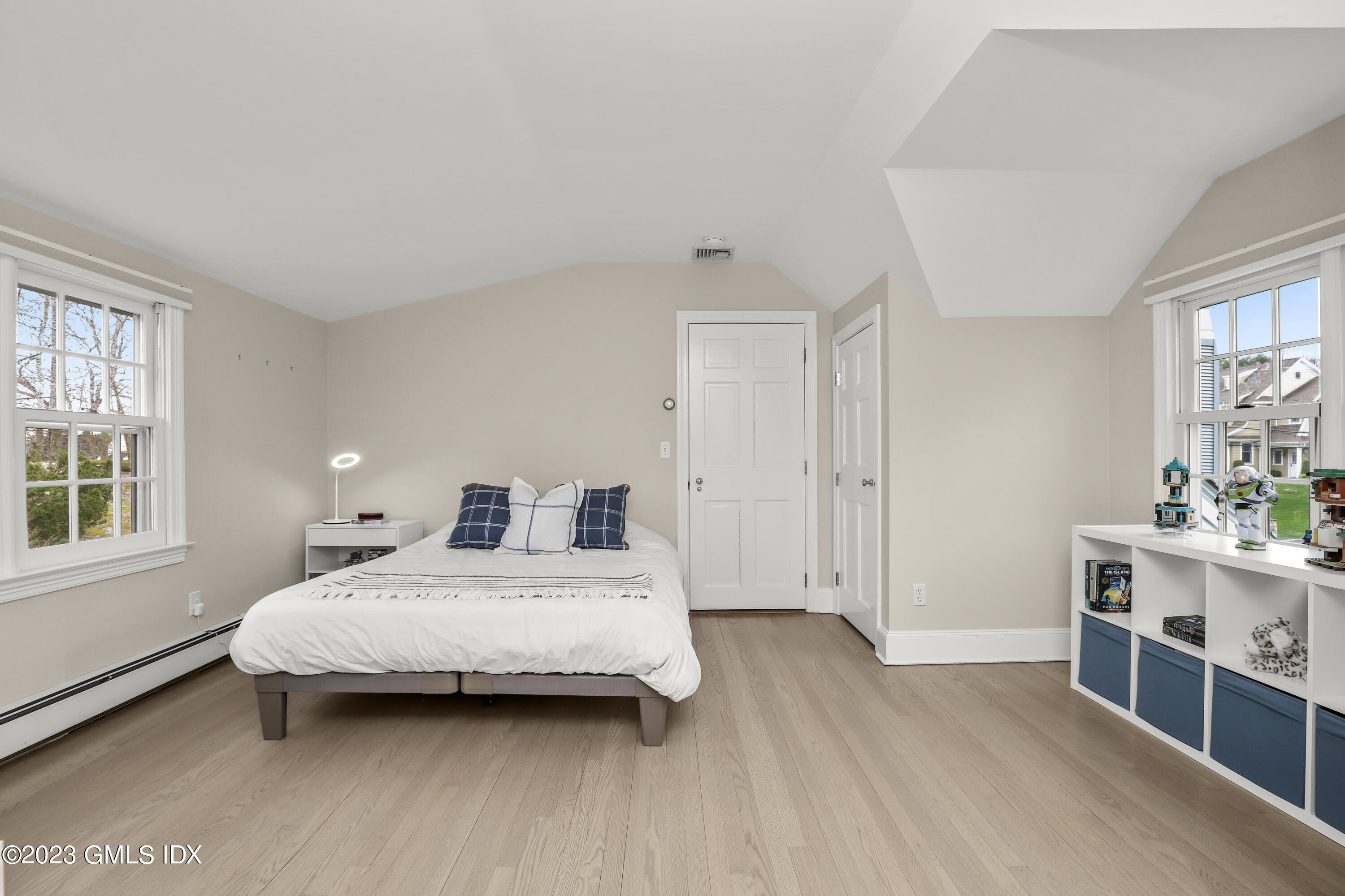 33 Bote Road Greenwich, CT 06830 - Photo 24 of 33 a bedroom with a bed and a desk in it