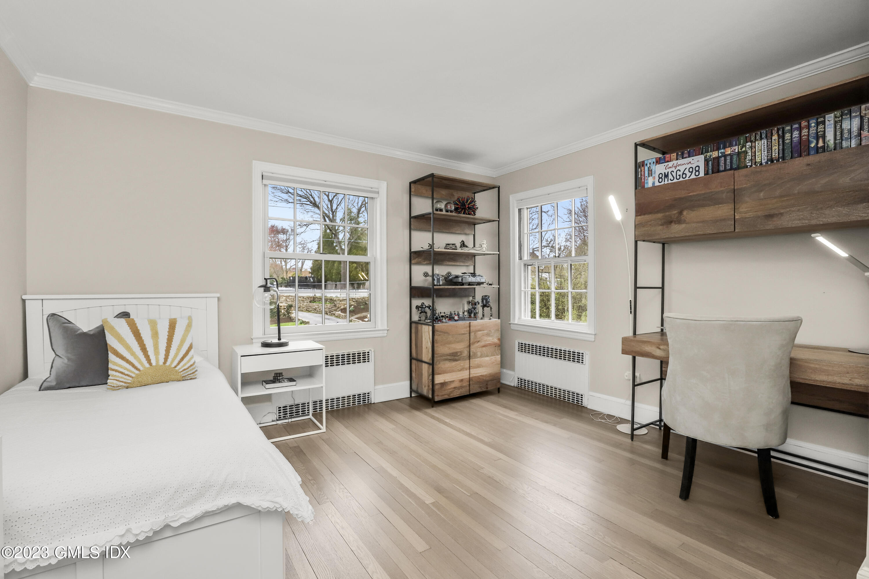 33 Bote Road Greenwich, CT 06830 - Photo 25 of 33 a bedroom with furniture and a book shelf