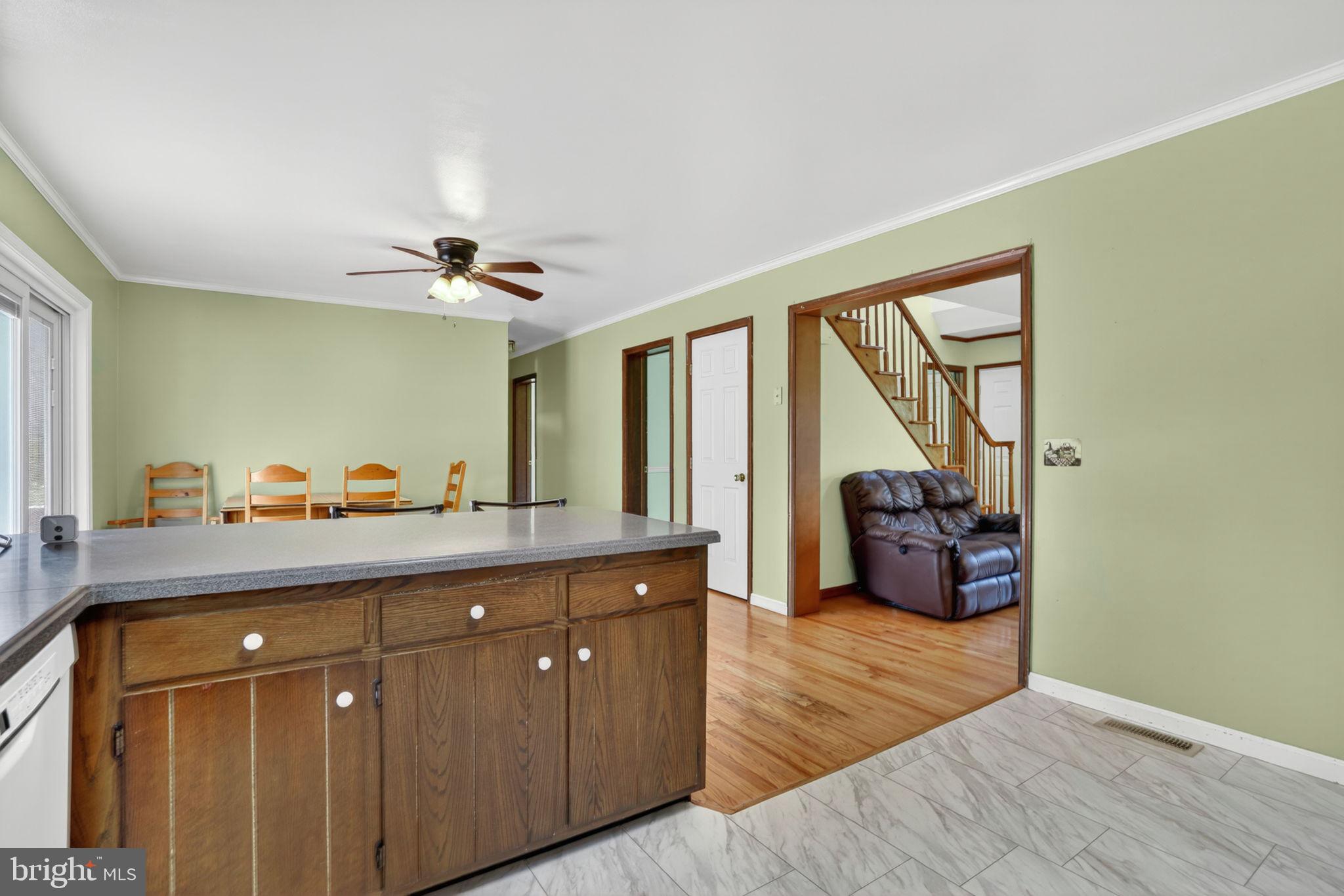 14123 Winterville Road Bloxom, VA 23308 - Photo 11 of 84 a view of living room with furniture and a large window