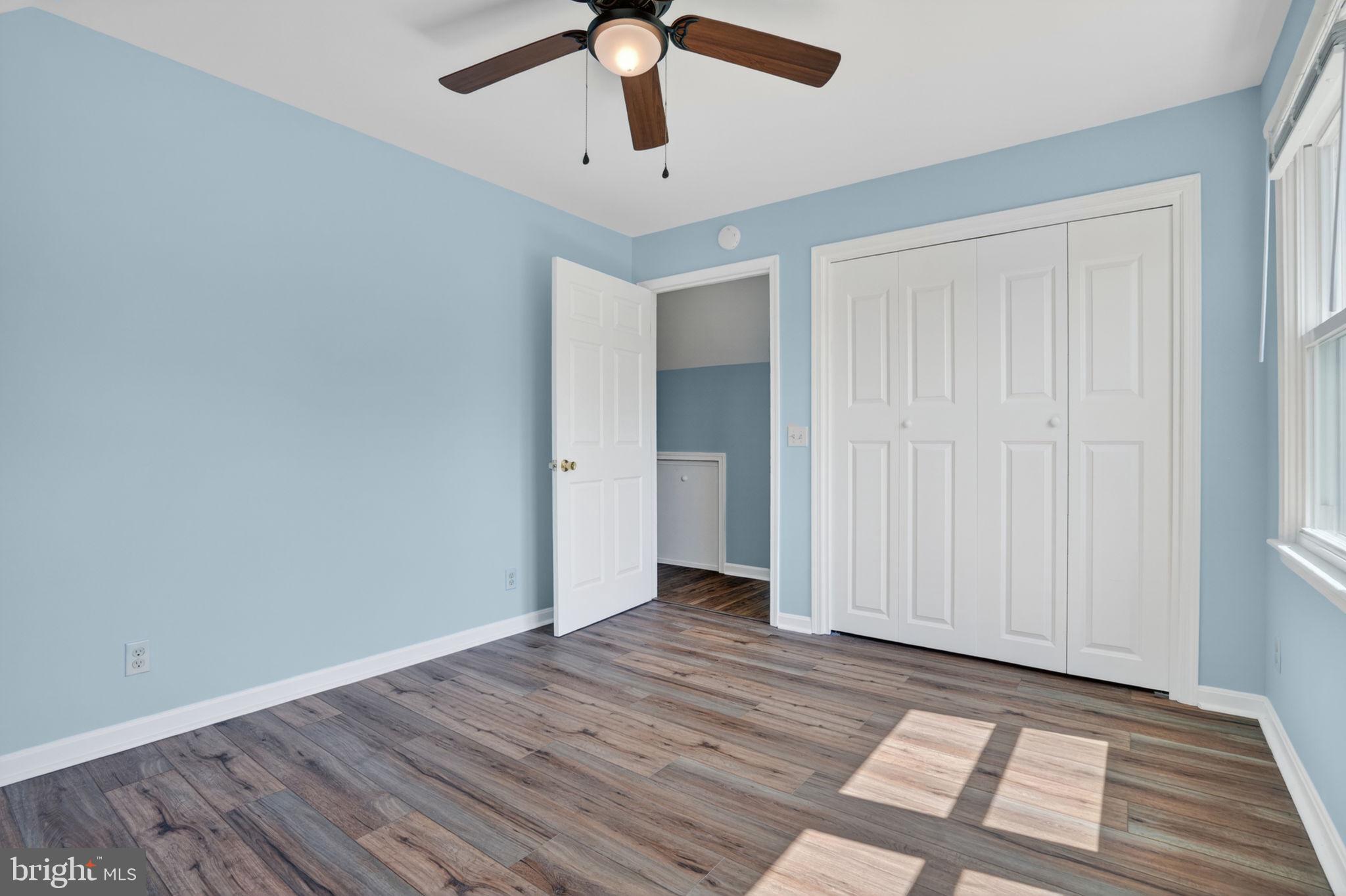 14123 Winterville Road Bloxom, VA 23308 - Photo 26 of 84 wooden floor in an empty room with a window