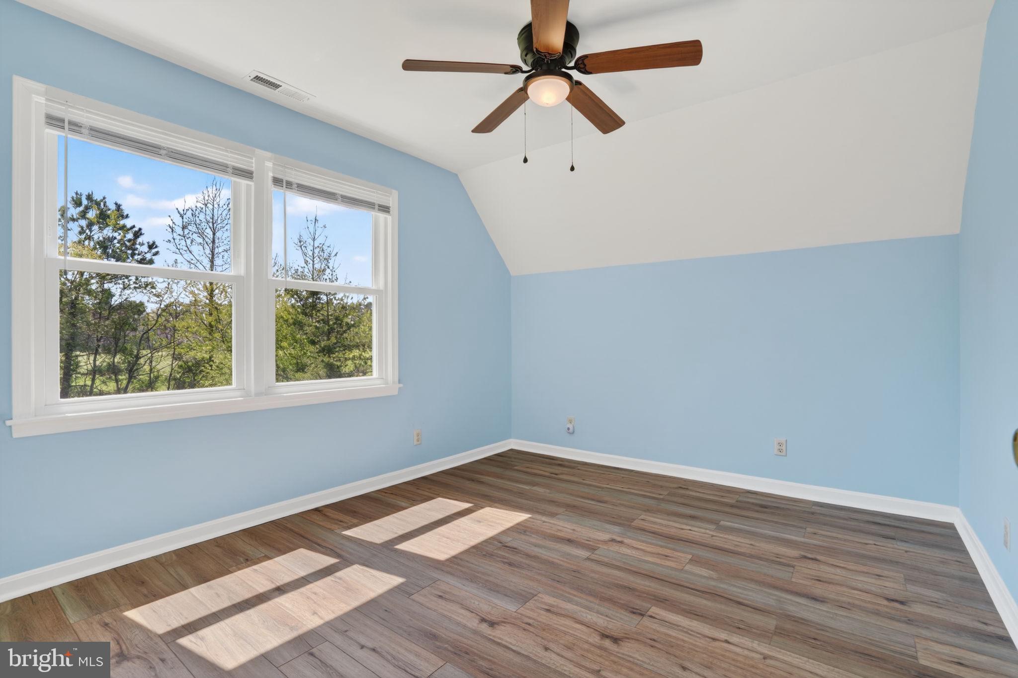 14123 Winterville Road Bloxom, VA 23308 - Photo 27 of 84 wooden floor in an empty room with a window