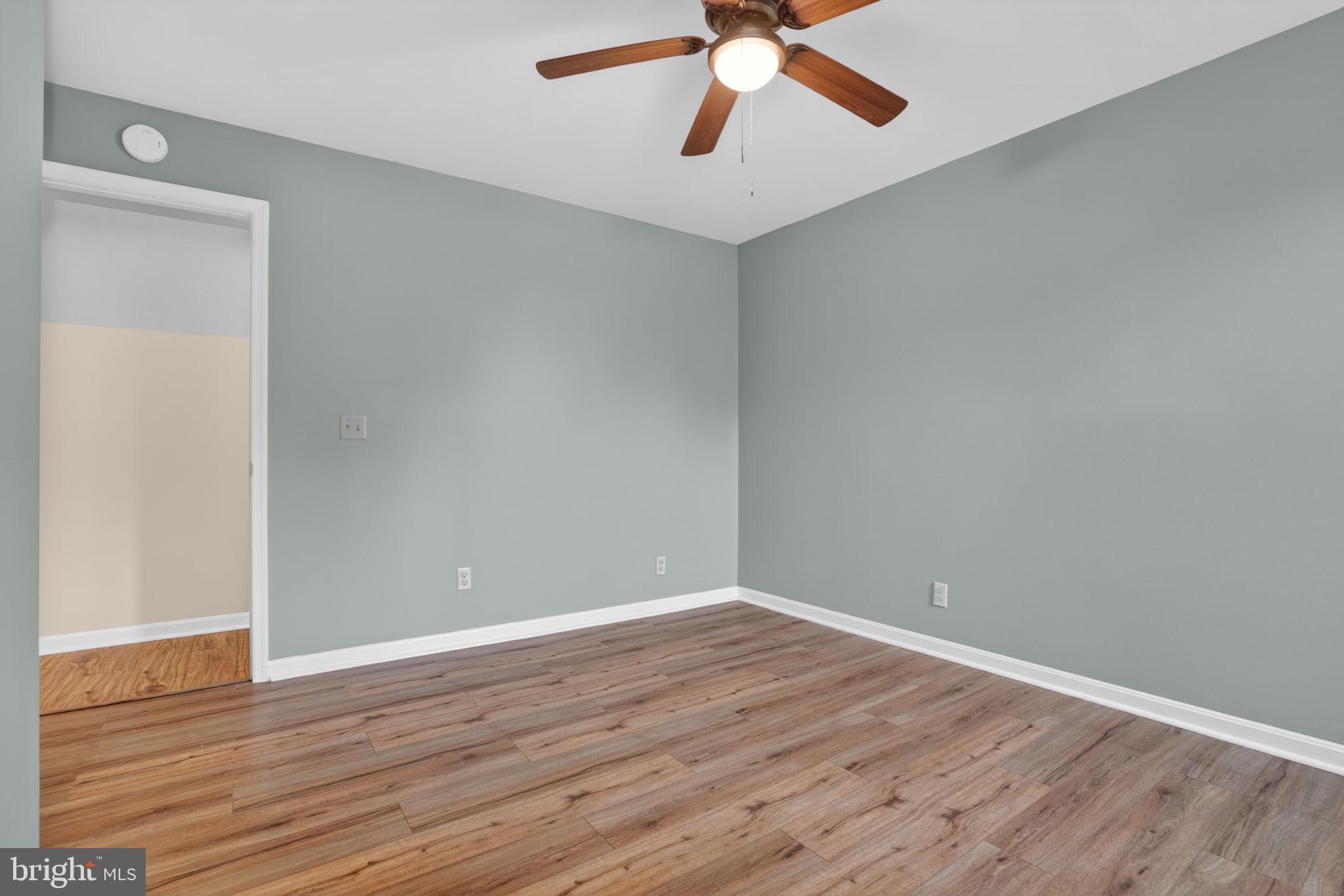 14123 Winterville Road Bloxom, VA 23308 - Photo 30 of 84 a view of an empty room with wooden floor