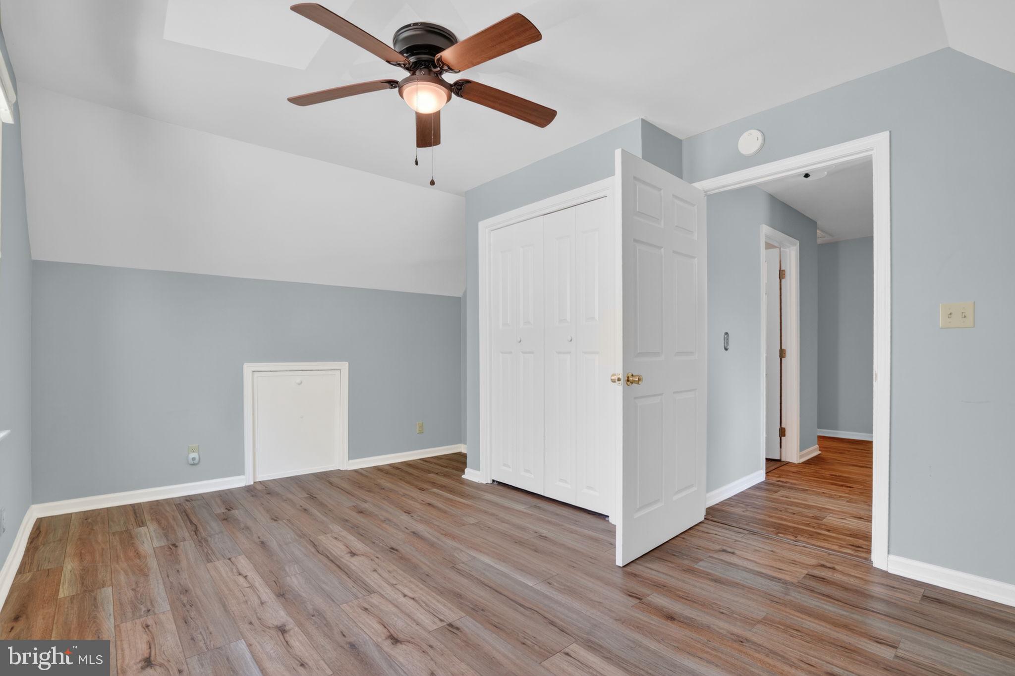 14123 Winterville Road Bloxom, VA 23308 - Photo 35 of 84 a view of a room with wooden floor and ceiling fan