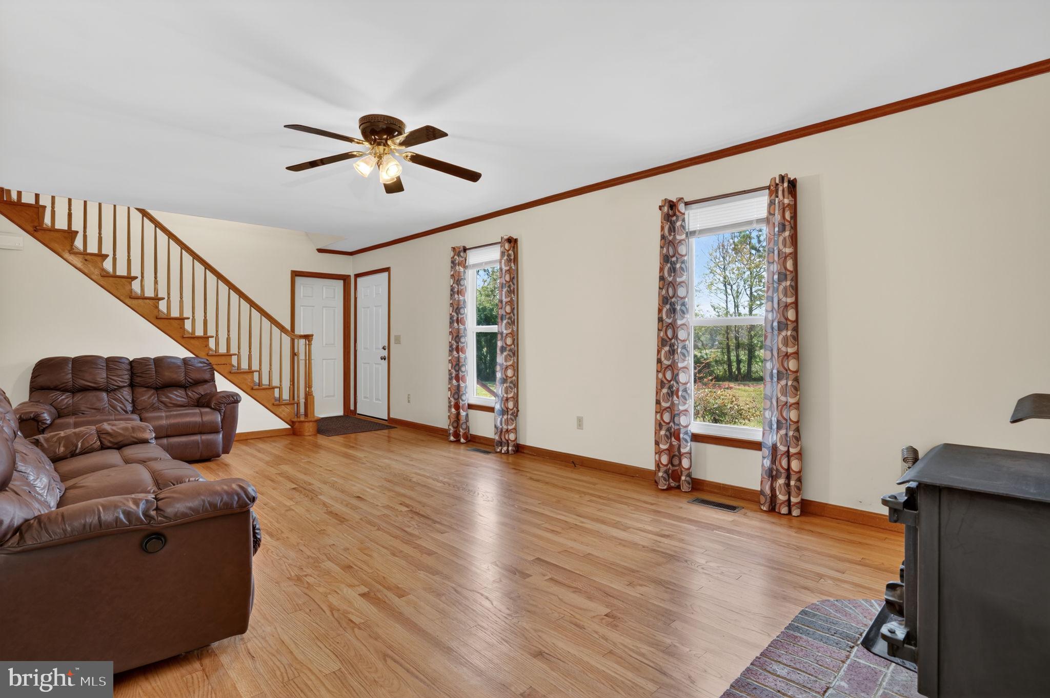 14123 Winterville Road Bloxom, VA 23308 - Photo 4 of 84 a living room with furniture and a window