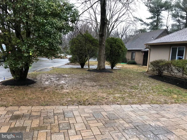 a view of deck with table and chairs a barbeque with wooden fence
