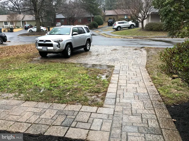 a view of a street with cars