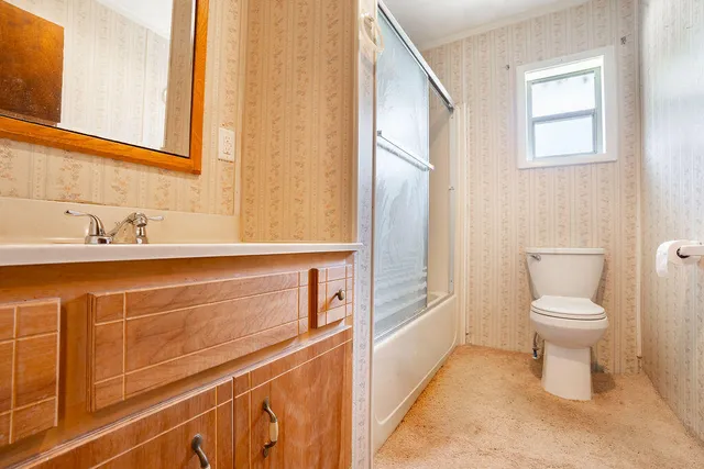 a bathroom with a sink and a toilet