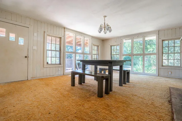 a view of a livingroom with furniture window and outside view