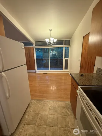 a view of a kitchen with a sink