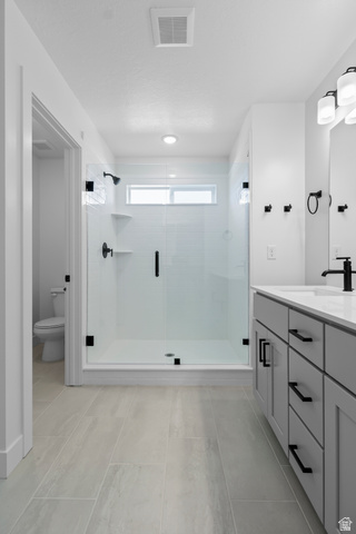 2816 West Aurora Avenue Mapleton, UT 84664 - Photo 11 of 20 Bathroom featuring a stall shower and vanity