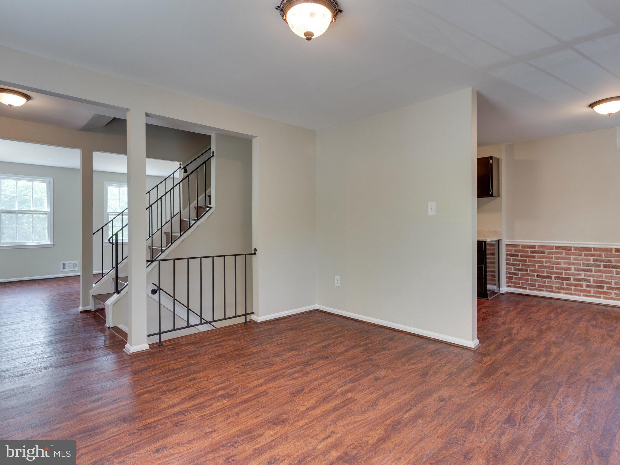 13133 Putnam Circle Woodbridge, VA 22191 - Photo 10 of 30 a view of entryway with wooden floor