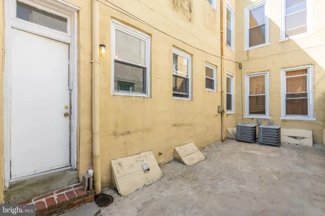 a view of brick building with outdoor space