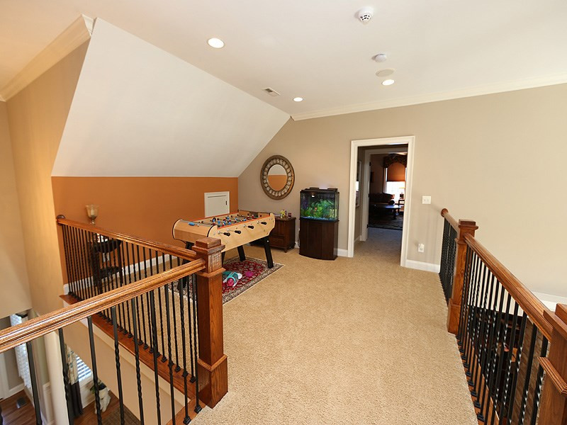 12913 Baybriar Drive Raleigh, NC 27613 - Photo 18 of 25 The 2nd floor loft overlooks the family room and is a great place for a game table or study area. Storage can be found in the eaves and in the pull down attic which is partially floored. Loft