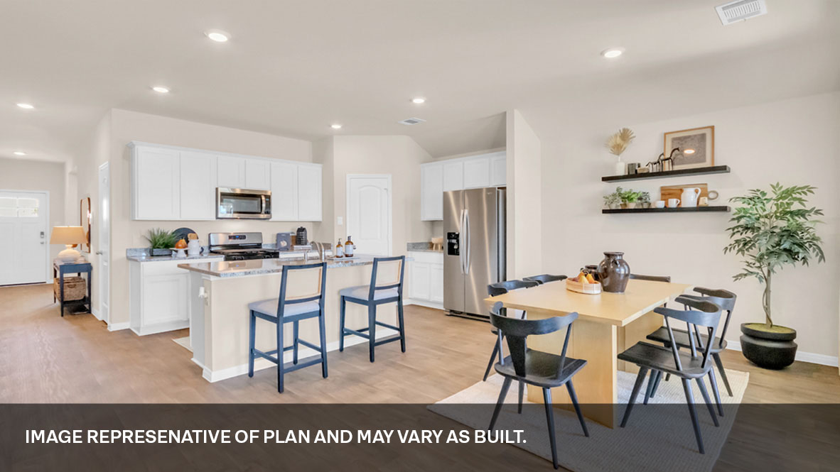 143 Morning Glory Loop Kyle, TX 78640 - Photo 21 of 34 a kitchen with stainless steel appliances kitchen island granite countertop a dining table chairs and refrigerator