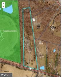 4819 Sudley Road Catharpin, VA 20143 - Photo 1 of 5 a bathroom with a shower and a sink