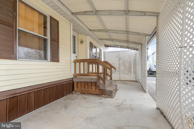 a view of a porch with furniture