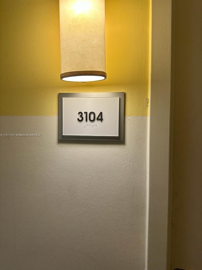 465 Brickell Avenue, Unit 3104 Miami, FL 33131 - Photo 19 of 21 a sign that is on a wall