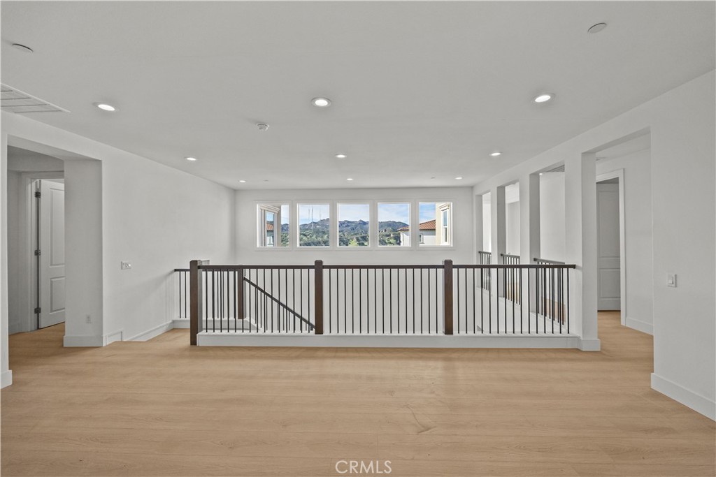 20638 Deer Grass Court Porter Ranch, CA 91326 - Photo 25 of 50 a view of a hallway