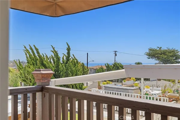 a view of a balcony with an outdoor space