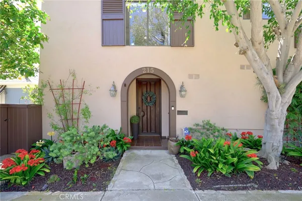 a house with a flower garden