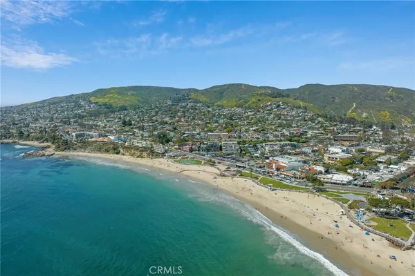 a view of a city with mountains in the background