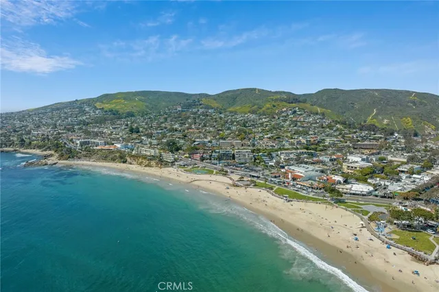 a view of a city with mountains in the background