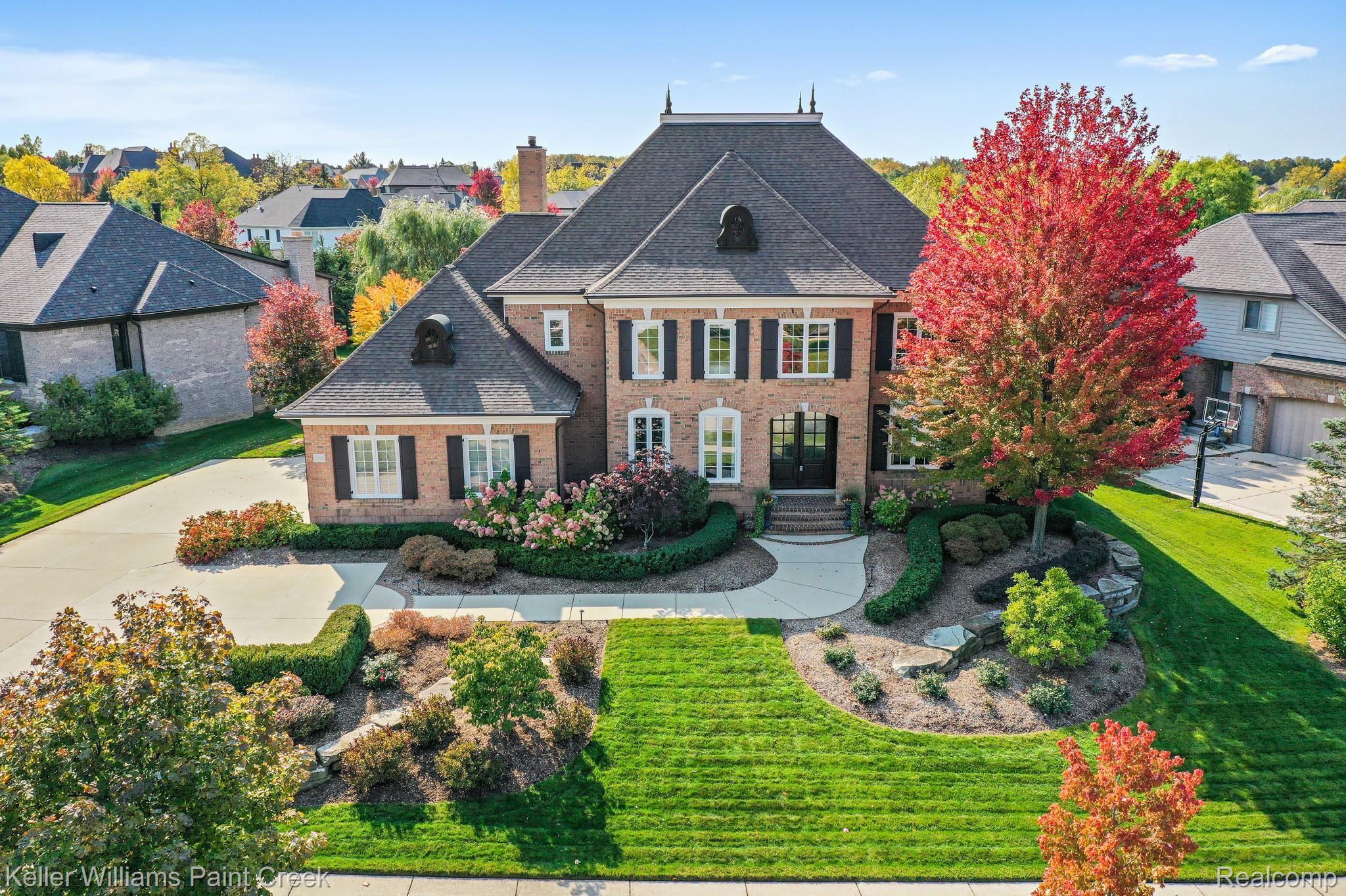 Mature Landscaping perfectly accentuates the stately curb appeal