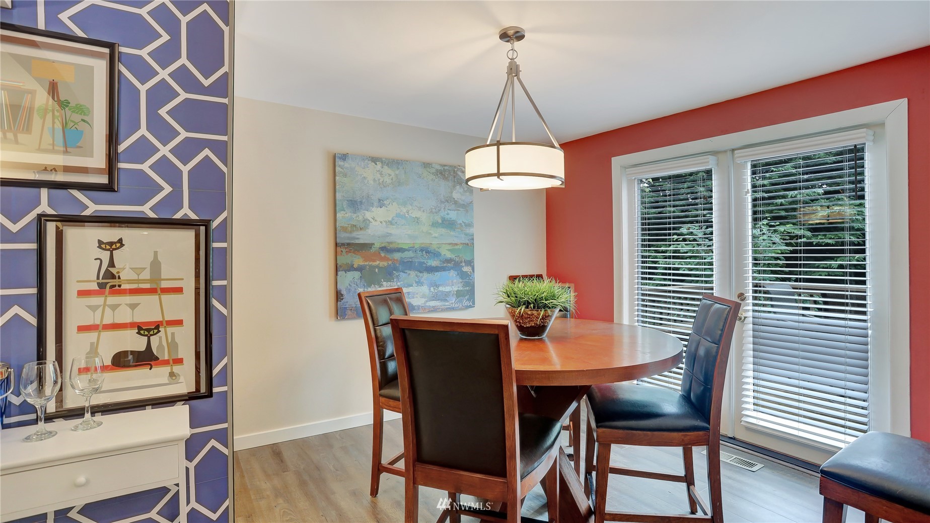 5213 Northeast 23rd Court Renton, WA 98059 - Photo 6 of 29 a view of a dining room with furniture window and wooden floor